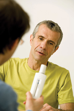 Patient receiving spirometer training