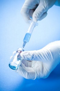 Vaccine, vial and syringe